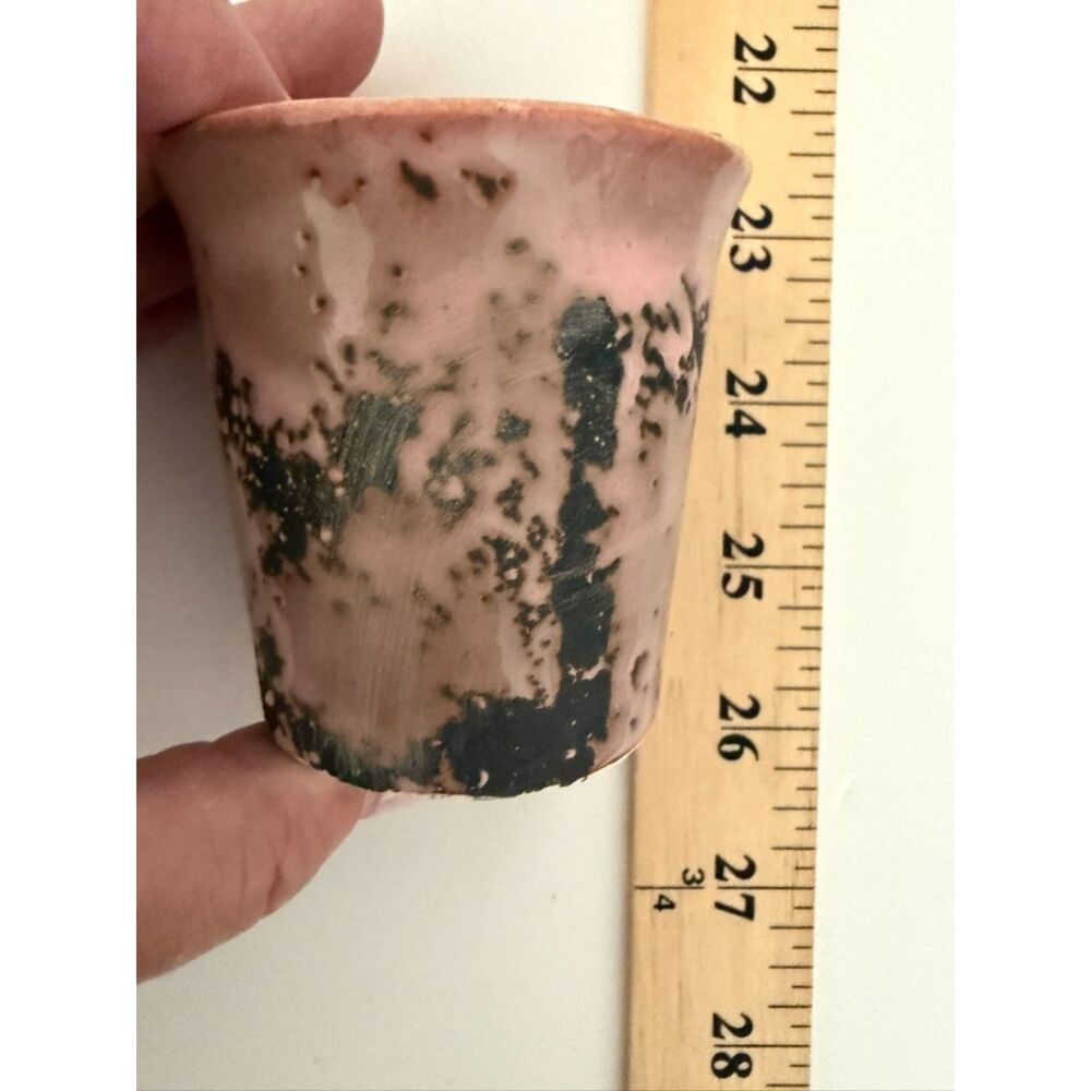 handmade pink and black glazed ceramic yunomi or cafe cup